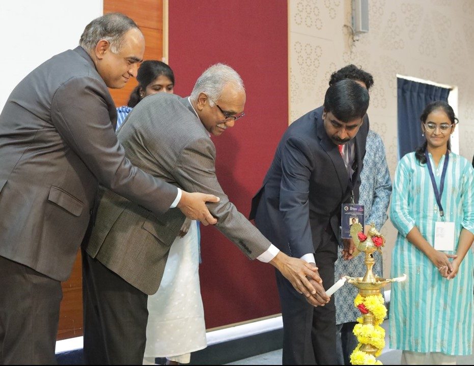 Lighting of the lamp by Professor K. Jaishankar and Dr. A. V. S. Murthy, Chancellor, RV University